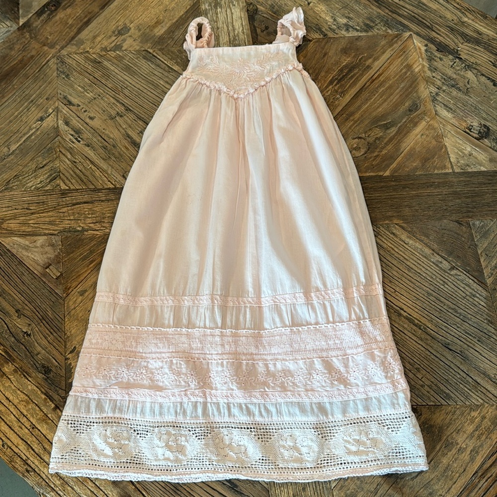 Mayoral summer dress with crisscrossed sleeves.
